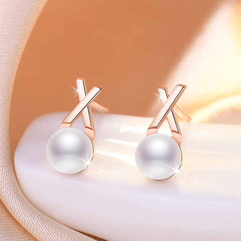 Damen Ohrstecker mit elegantem Perlendesign und modernem Kreuzmotiv Shop Nory