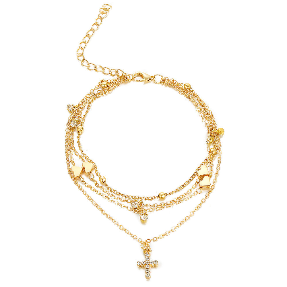 Damenarmband mit zierlichen Herz- und Perlenakzenten Shop Nory