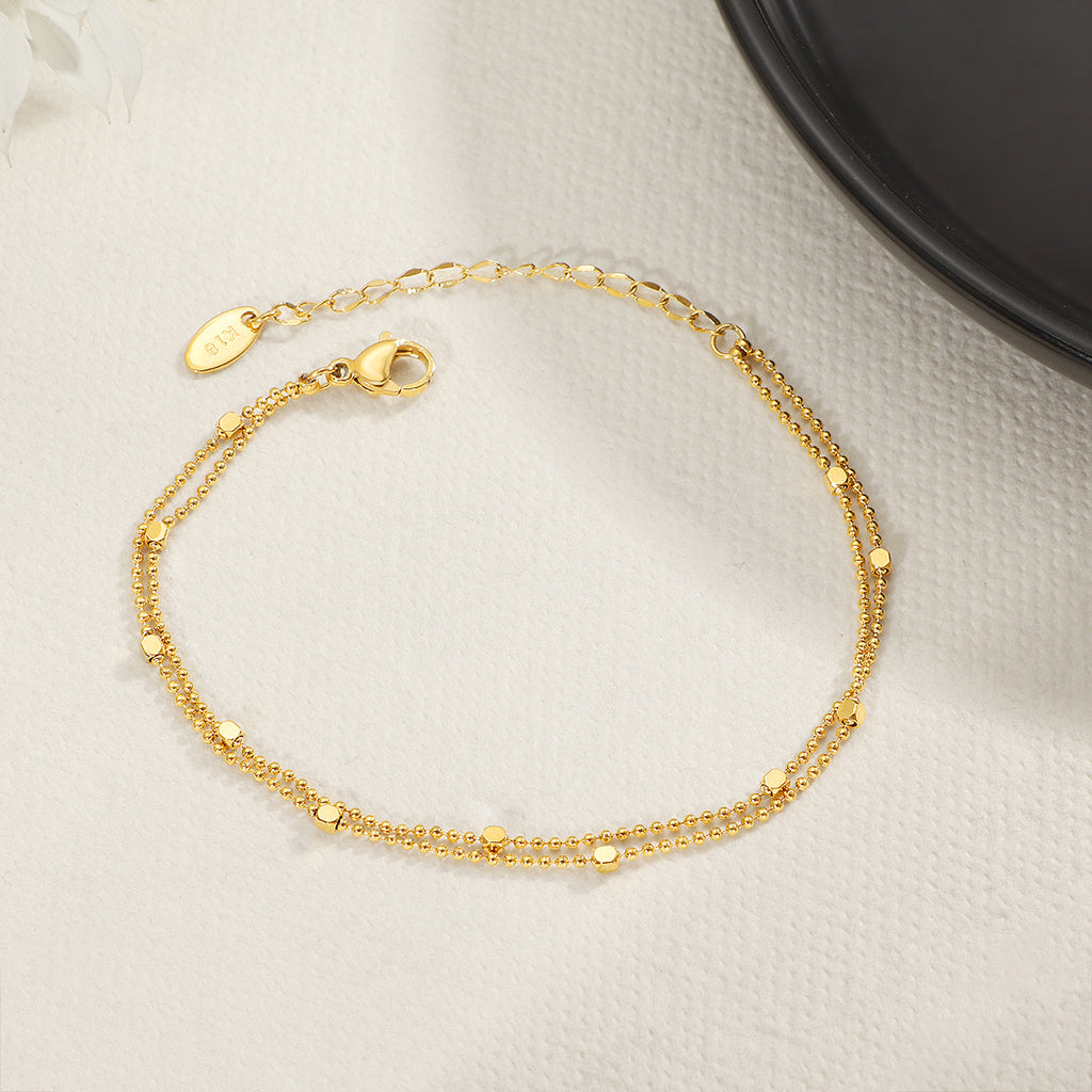 Damen zierliches Armband mit doppelter Kettenanordnung und funkelnden Akzenten Shop Nory