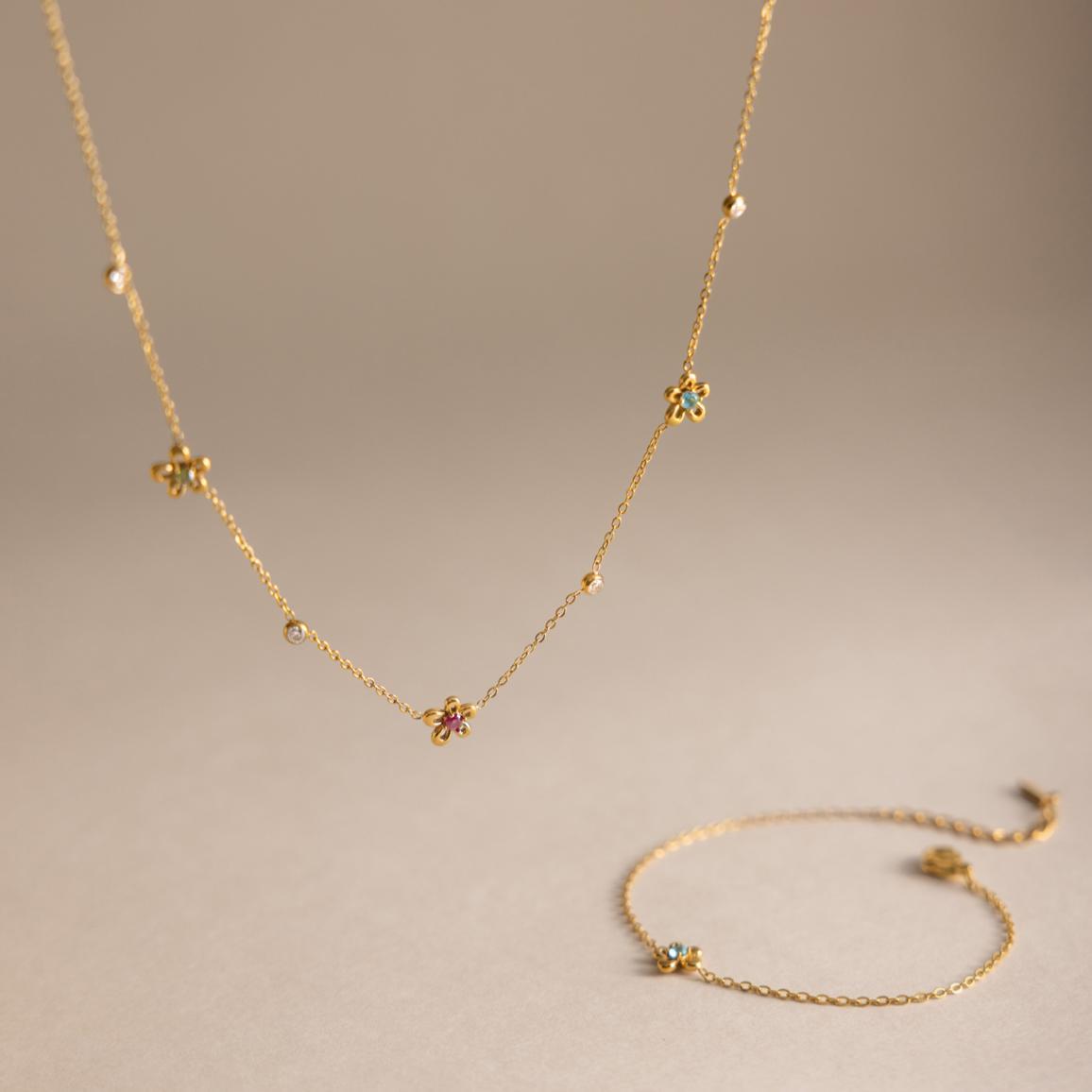 Damen Halskette mit floralen Anhängern und hypoallergener Edelstahlverarbeitung Shop Nory