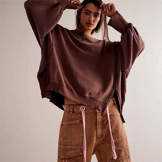Damen oversized Sweatshirt mit Ballonärmeln, offenen Saumnähten und seitlichen Schlitzen Shop Nory