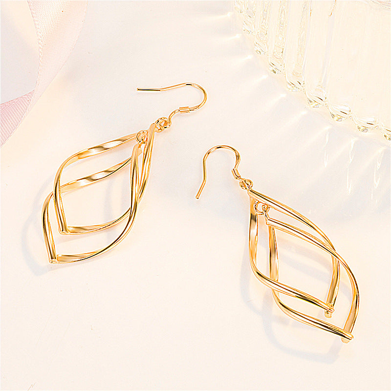 Damen elegante Ohrringe mit geschwungenem Design Shop Nory