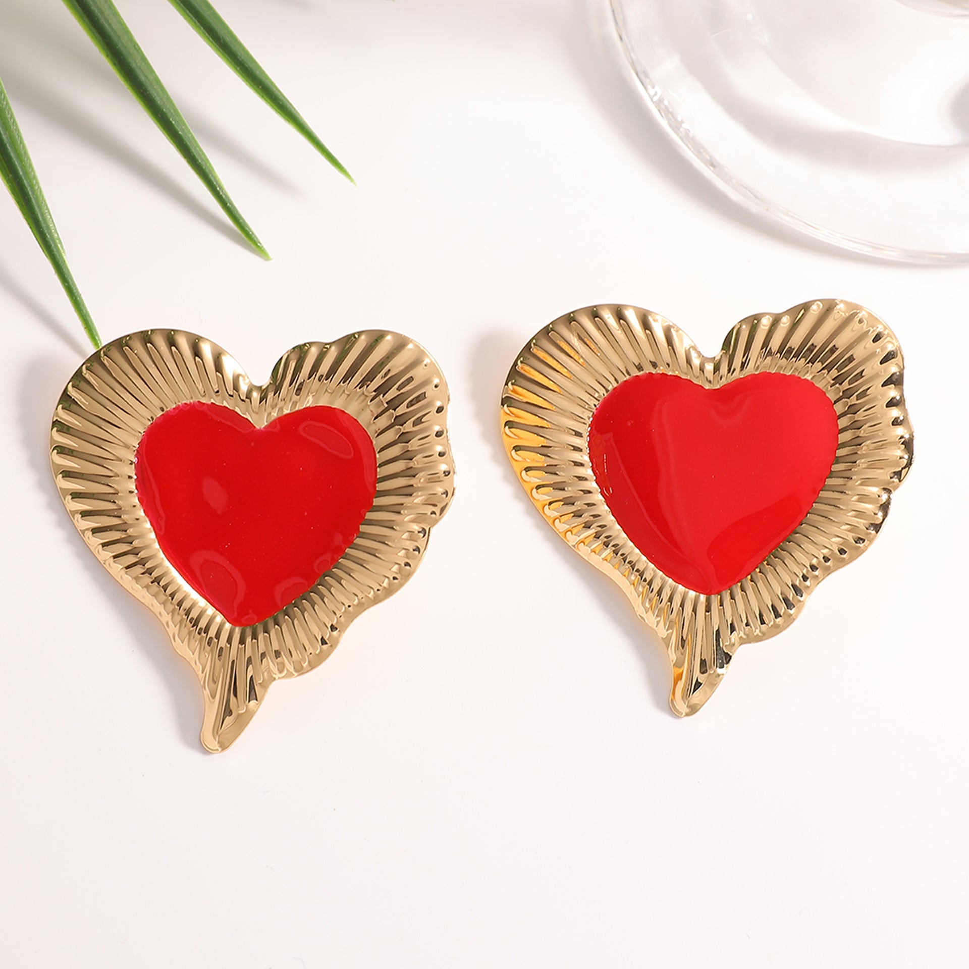 Damen Ohrringe im herzförmigen, glamourösen Design Shop Nory