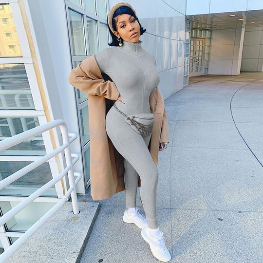 Damen Figurbetonter Rippstrick-Overall mit Stehkragen und Frontreißverschluss Shop Nory