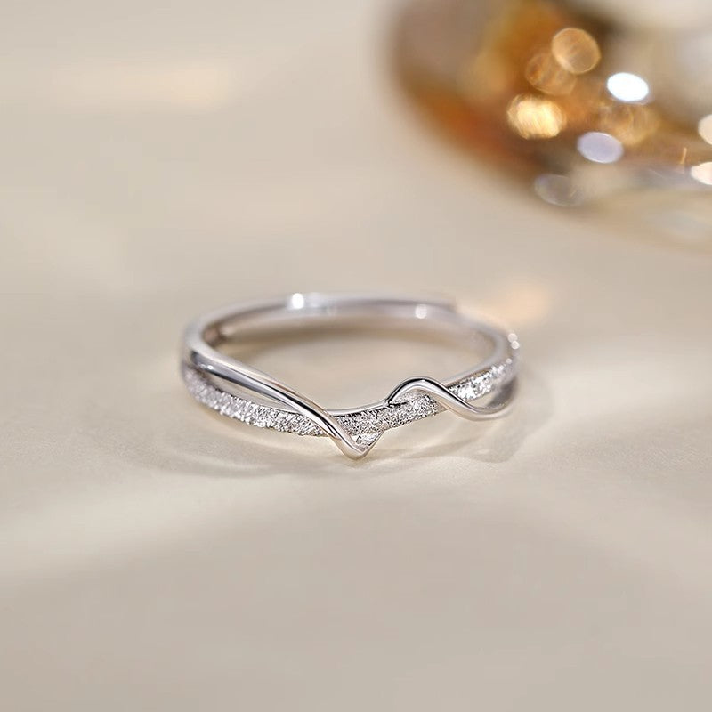 Damen zart geschwungener Ring mit funkelnden Zirkonia Shop Nory
