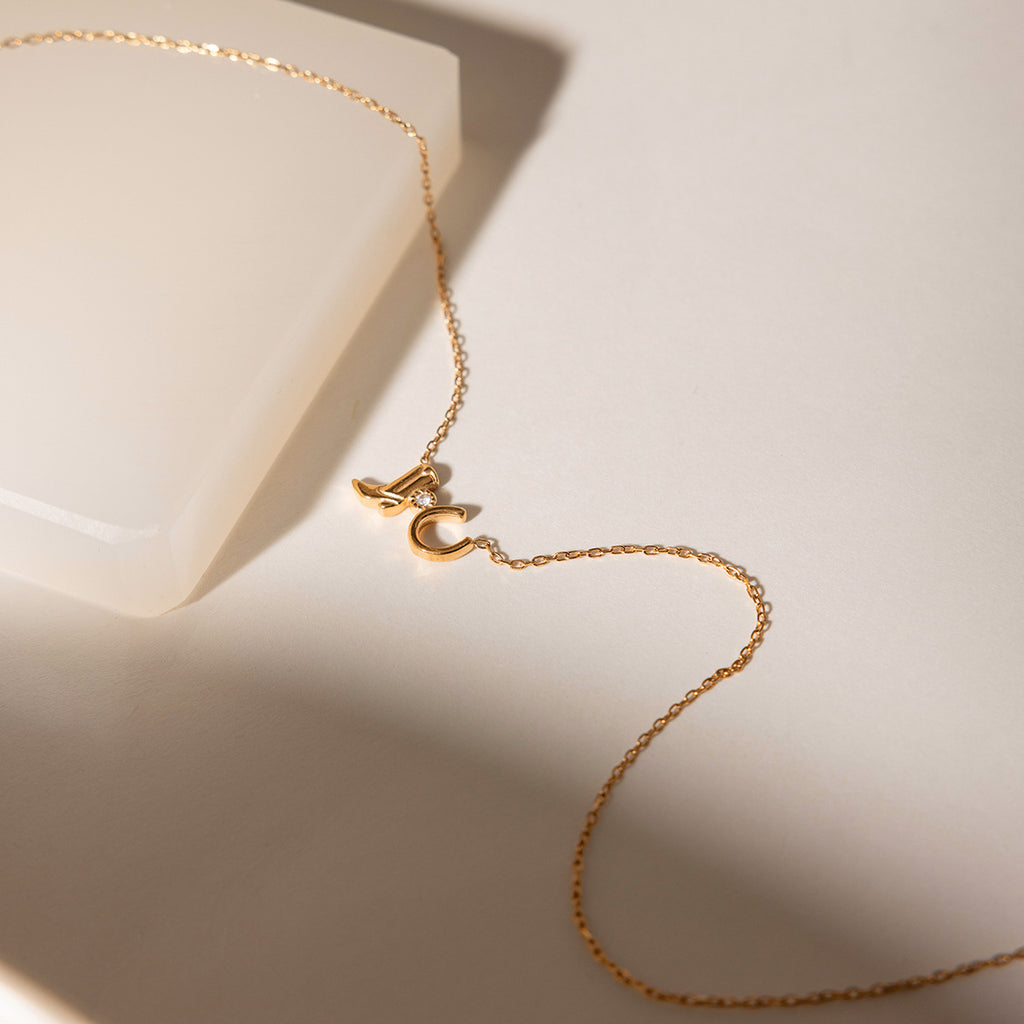 Damen Halskette mit stilvollem Stiefelanhänger und elegantem Zirkoniabesatz Shop Nory