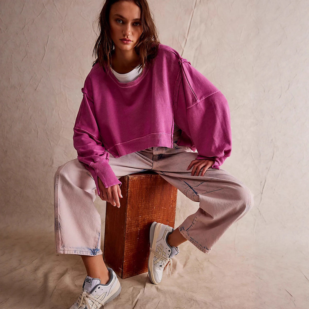 Damen cropped Oversize-Sweatshirt mit Daumenloch, fransigem Saum und weitem Raglanärmel Shop Nory