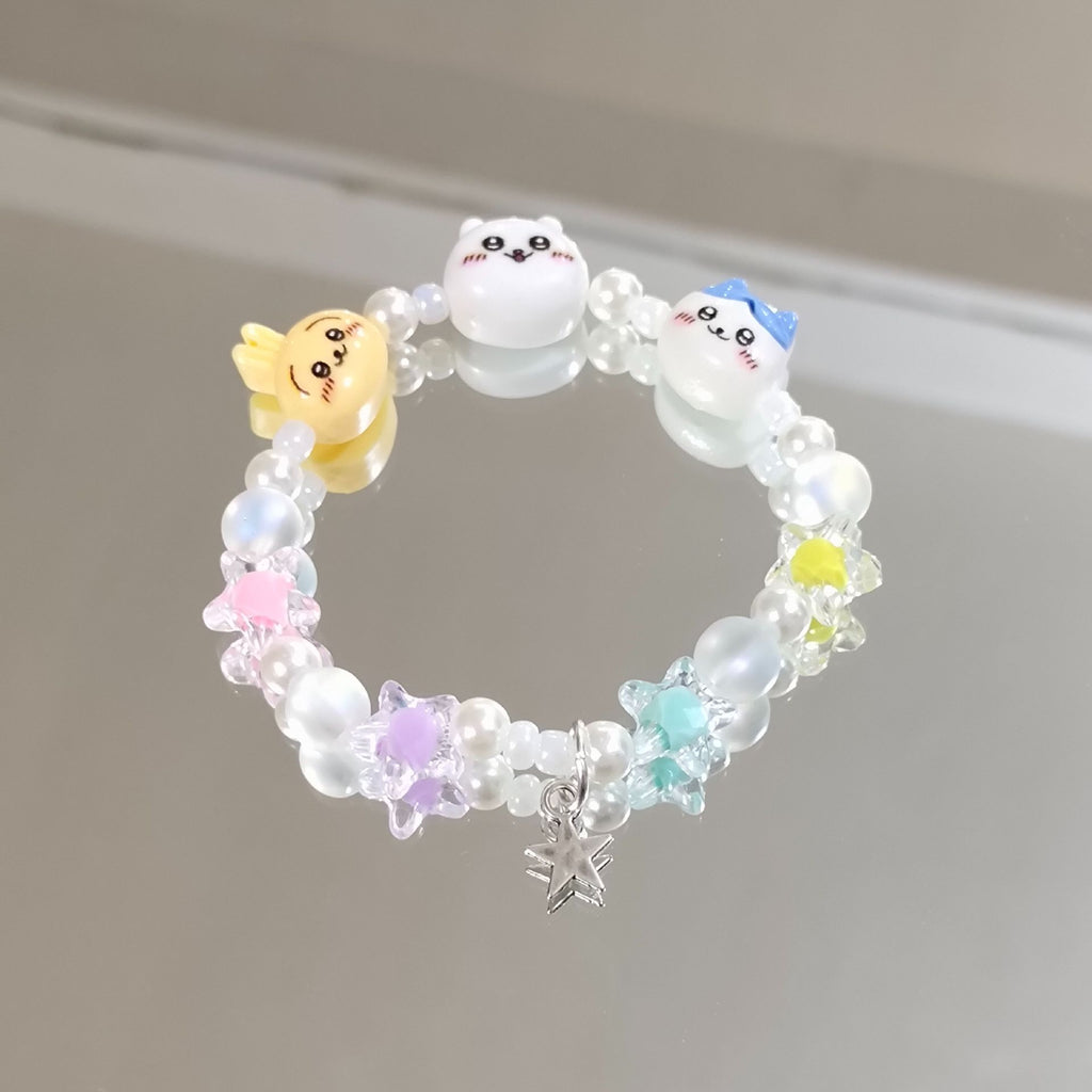 Damen Armband mit verspielten Tiermotiven und bunten Perlen Shop Nory