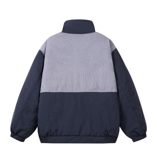Unisex Boxy-Pufferblouson mit hohem Stehkragen, Cord-Schulterpasse und großen Pattentaschen Shop Nory