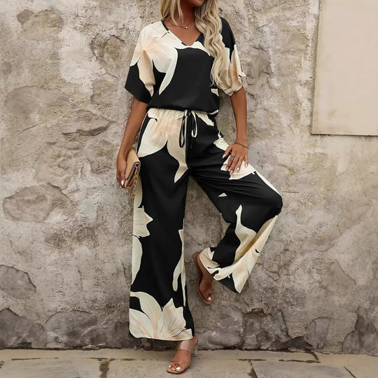 Damen Eleganter Jumpsuit mit floralen Mustern und weitem Bein