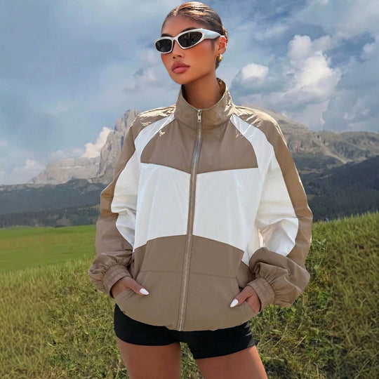 Damen Leichte Windbreaker-Jacke mit Stehkragen, Farbblock-Design und elastischen Bündchen Shop Nory