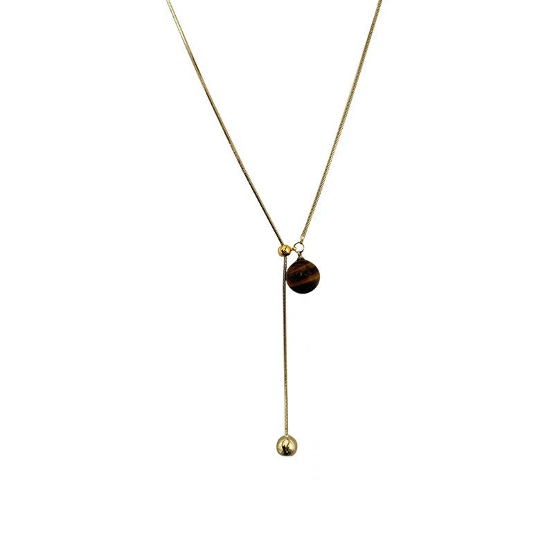 Damen Halskette mit einem einzigartigen Tigeraugen-Anhänger und glänzendem Gold-Design Shop Nory
