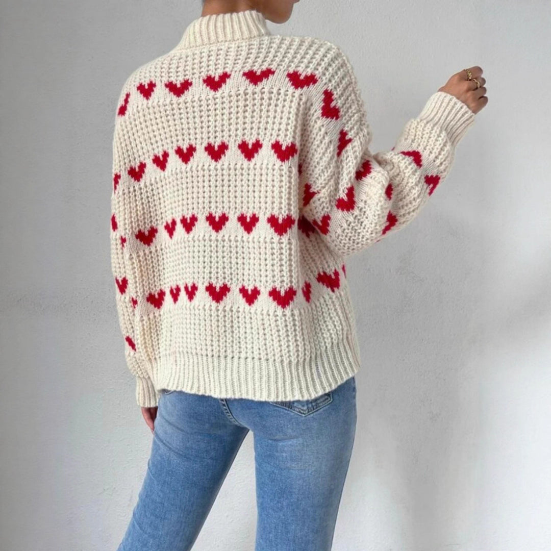 Damen nan Grobstrickpullover mit eingestrickten Herzmotiven, hohem Stehkragen und lässiger Oversize-Silhouette Shop Nory