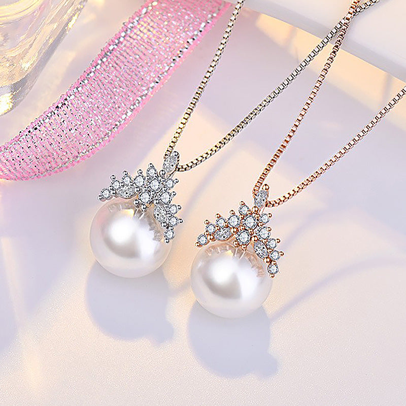 Damen Halskette mit kunstvollem Perlenanhänger und funkelnden Zirkonia-Details Shop Nory
