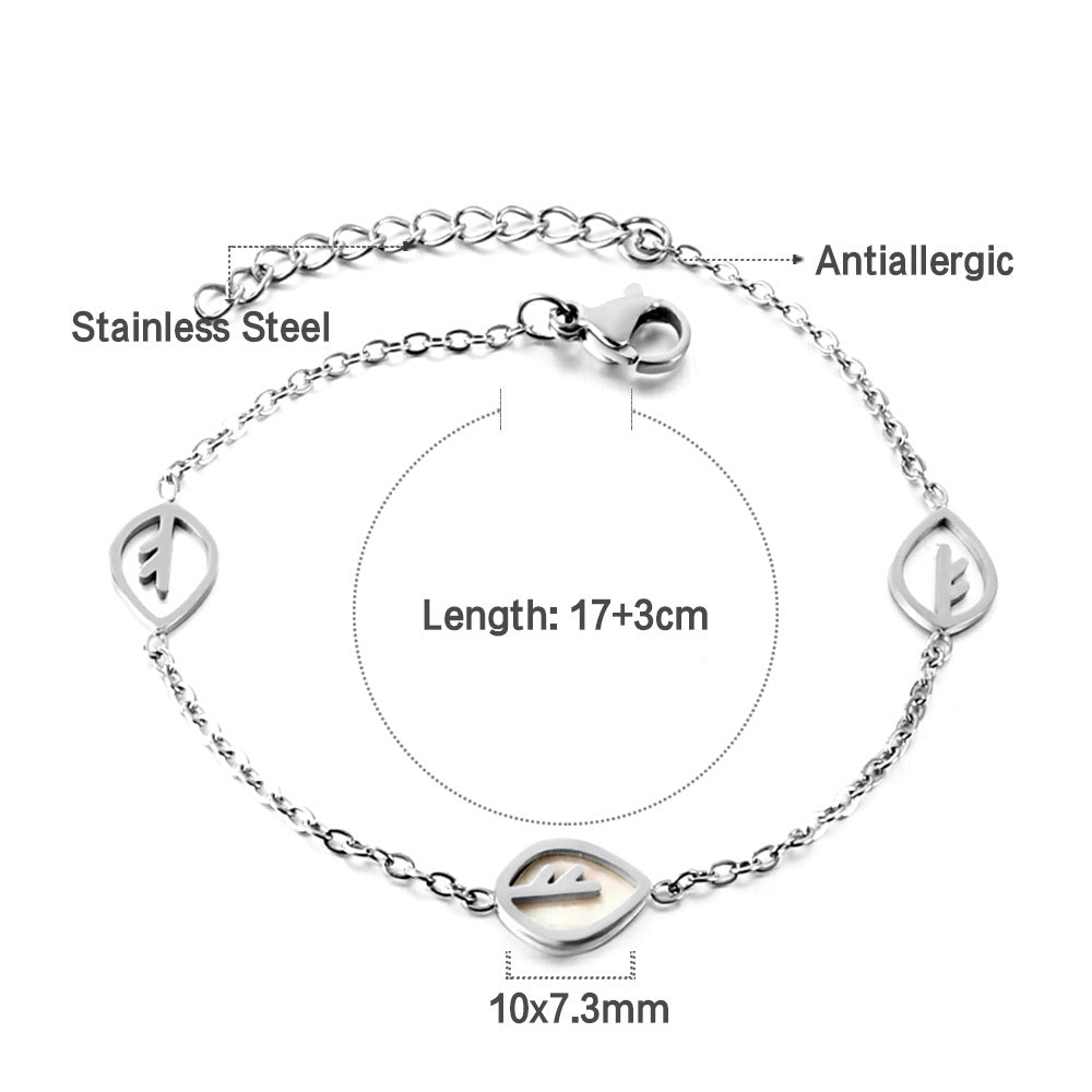 Damen Armband mit feinen Blattmotiven aus Edelstahl und goldplattierter Oberfläche Shop Nory