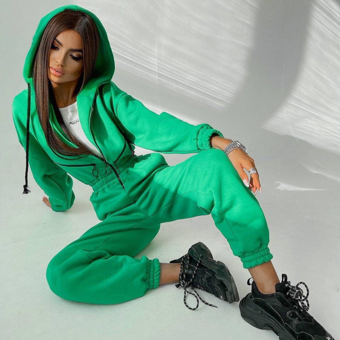 Damen taillierter Kapuzen-Jumpsuit mit elastischem Bund und markanten Kontrast-Reißverschlüssen Shop Nory