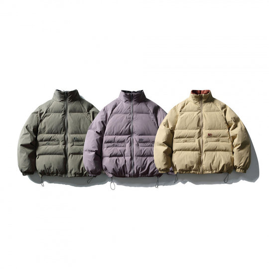Unisex Boxy wattierte Stehkragen‑Pufferjacke mit Tunnelzugsaum und Pattentaschen Shop Nory