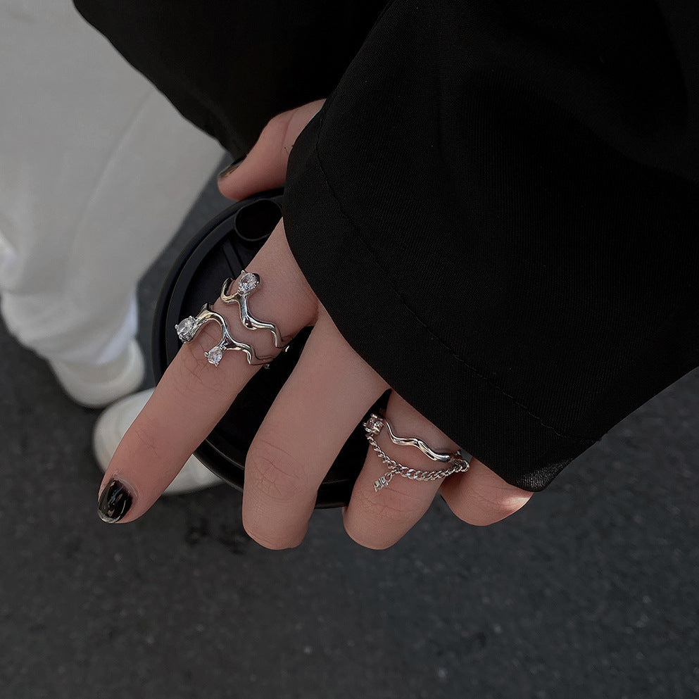 Damen Offener Ring mit elegantem Wellenmotiv und funkelnden Zirkonia Shop Nory