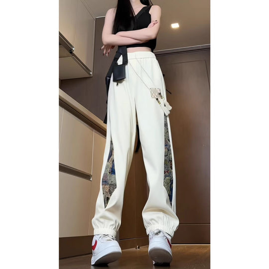 Damen Modische Sporthose mit einzigartigem Seiteneinsatz Shop Nory