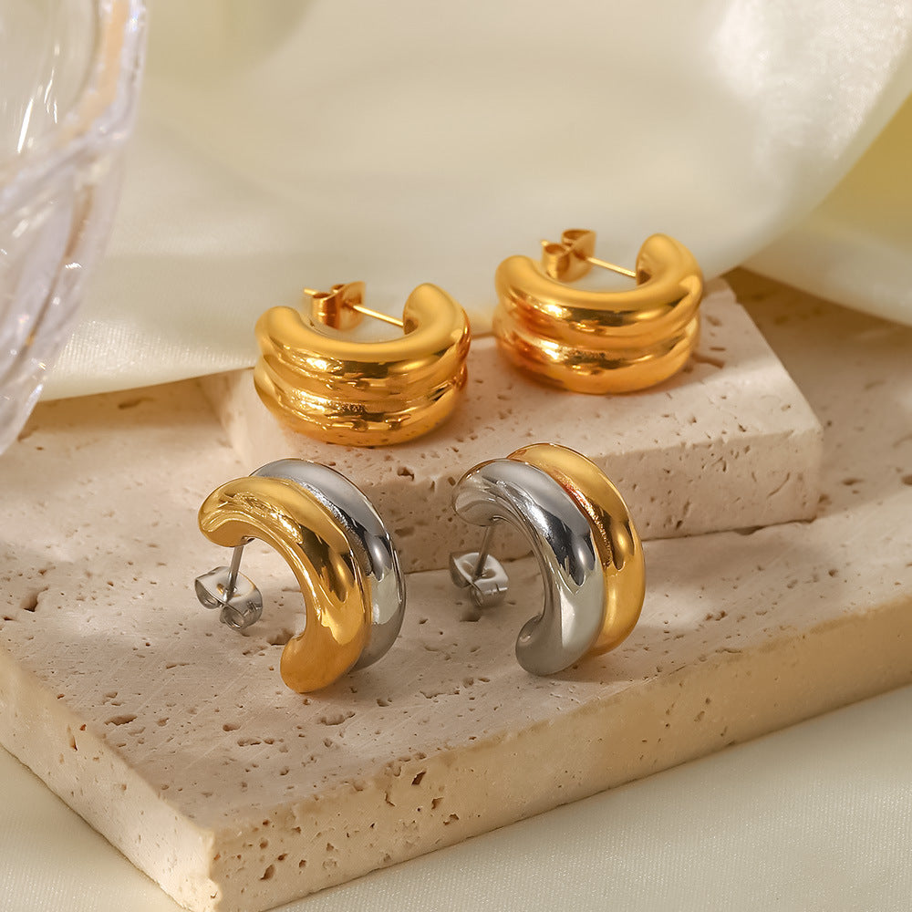 Damen Creolen mit elegantem Wellen-Design aus hochwertigem Edelstahl Shop Nory