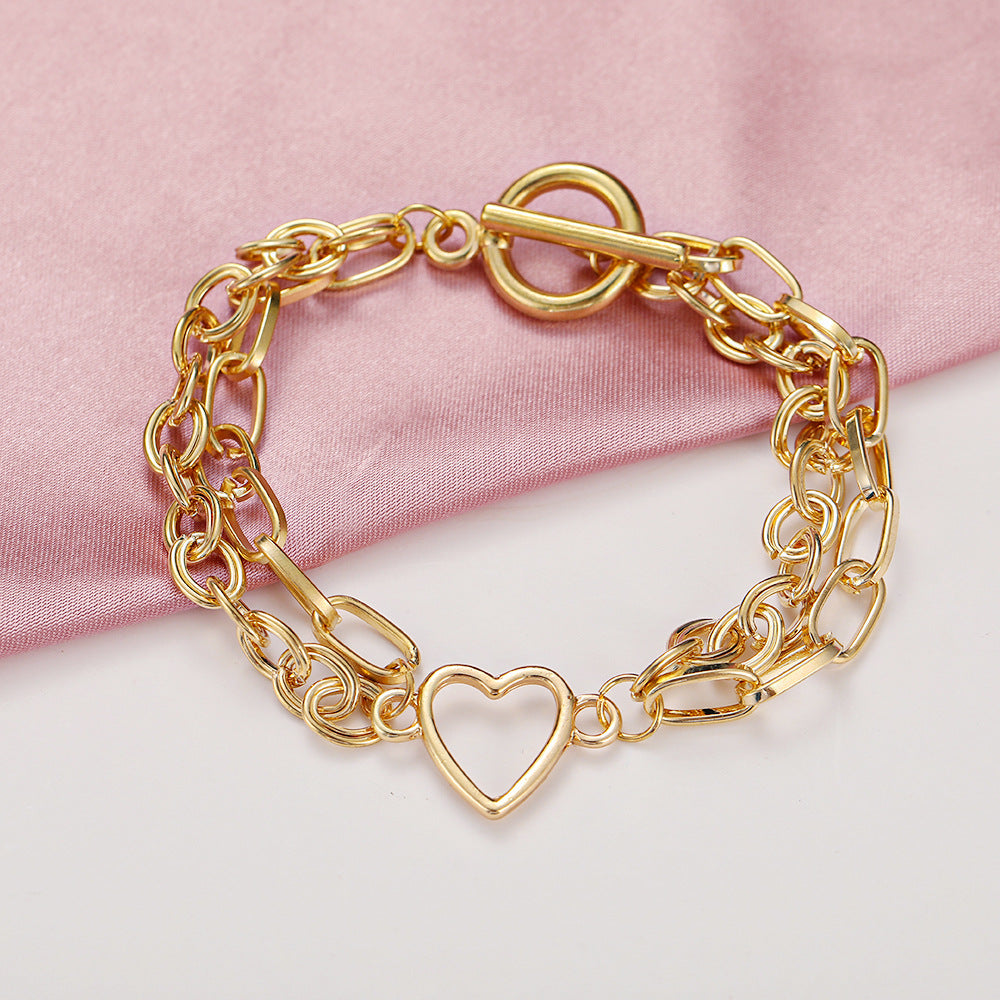 Damenarmband aus hochwertigem Edelstahl mit herzförmigem Anhänger Shop Nory