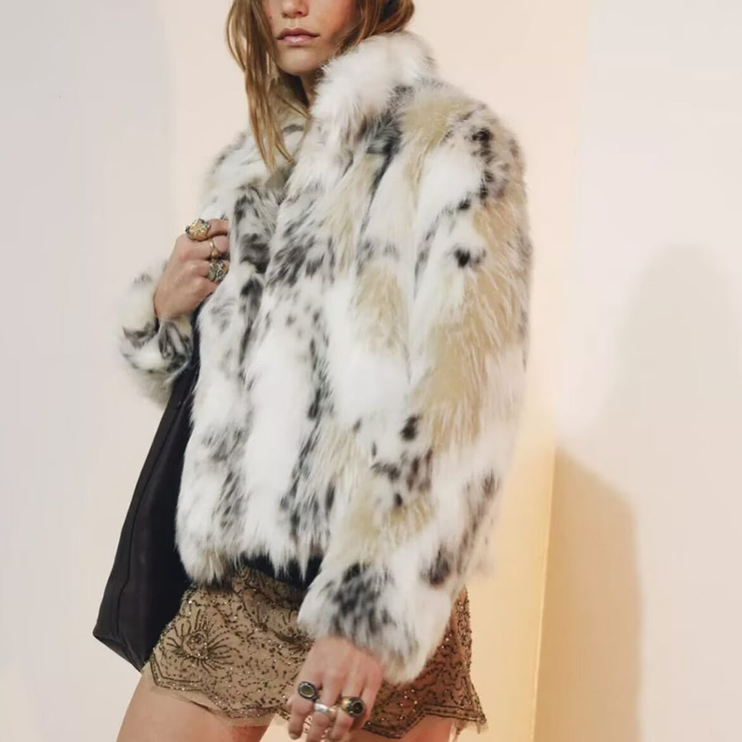 Damen Kurze Kunstfelljacke im Patchfell-Look mit hohem Stehkragen Shop Nory