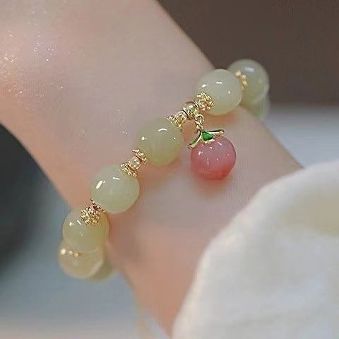 Damenarmband mit handgefertigten Jade- und Achat-Elementen sowie charmantem Obstanhänger Shop Nory
