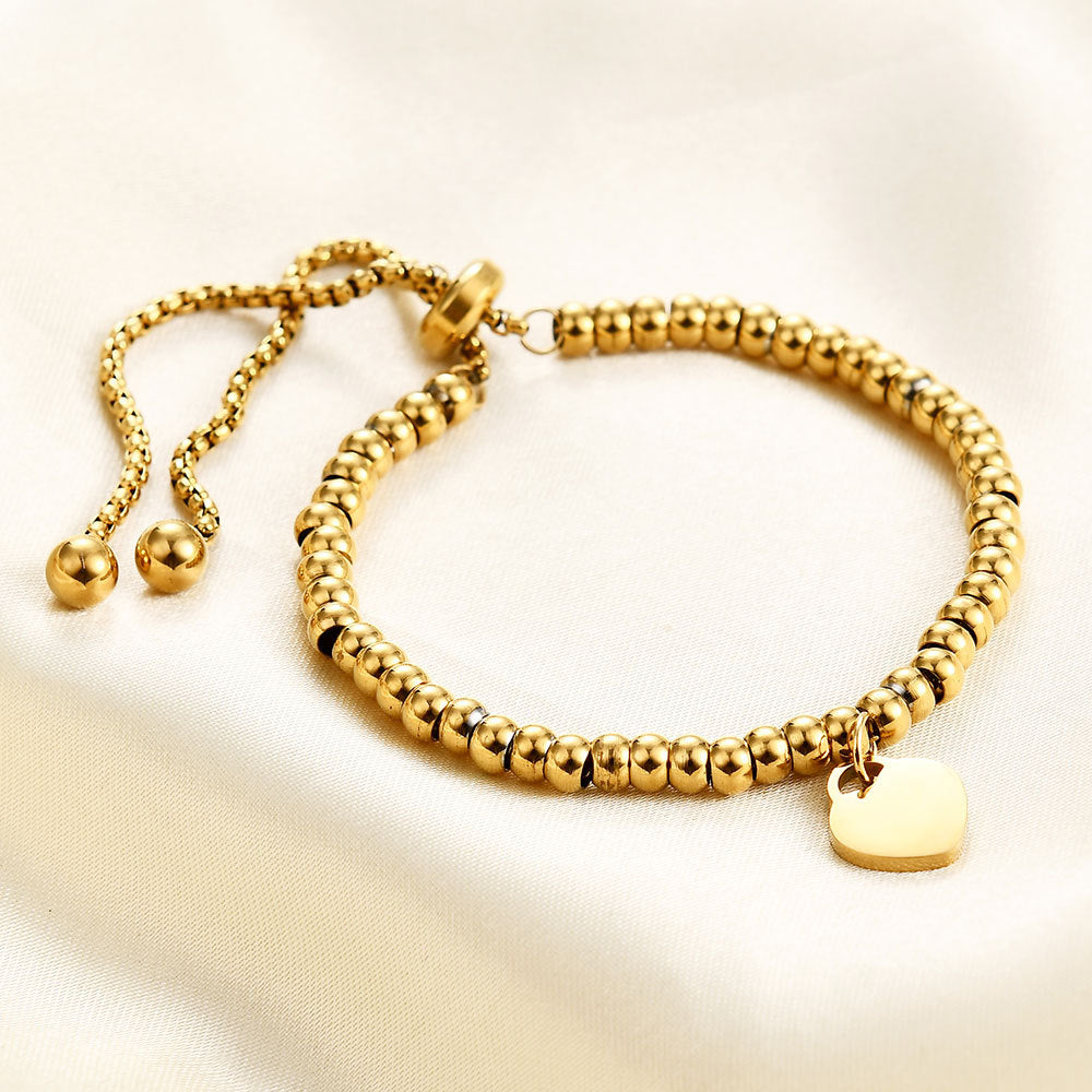 Damen Armband mit herzförmigem Anhänger und modernem Design Shop Nory