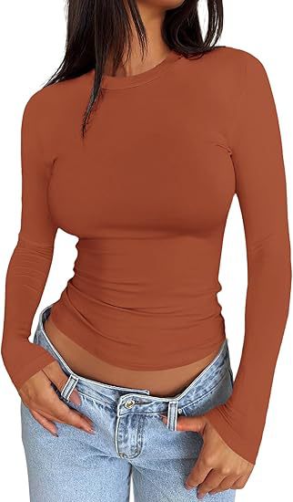 Damen Körpernahes Langarmshirt im Cropped-Look mit verlängerten Ärmeln und Daumenloch Shop Nory