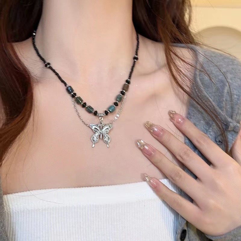 Damen Halskette mit kunstvollem Schmetterlingsanhänger und natürlichen Edelsteinen Shop Nory