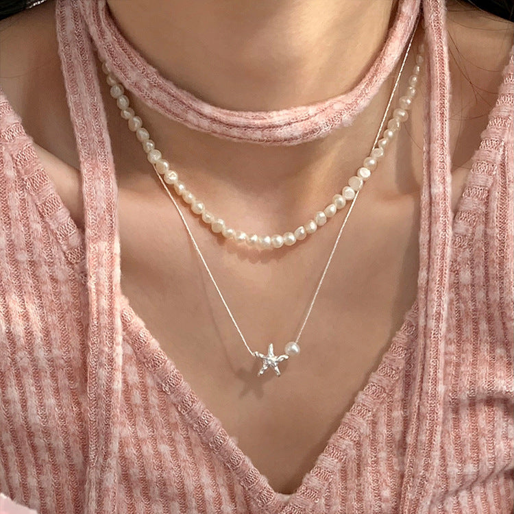 Damen Anhänger mit Sternenmotiv und Perle Shop Nory