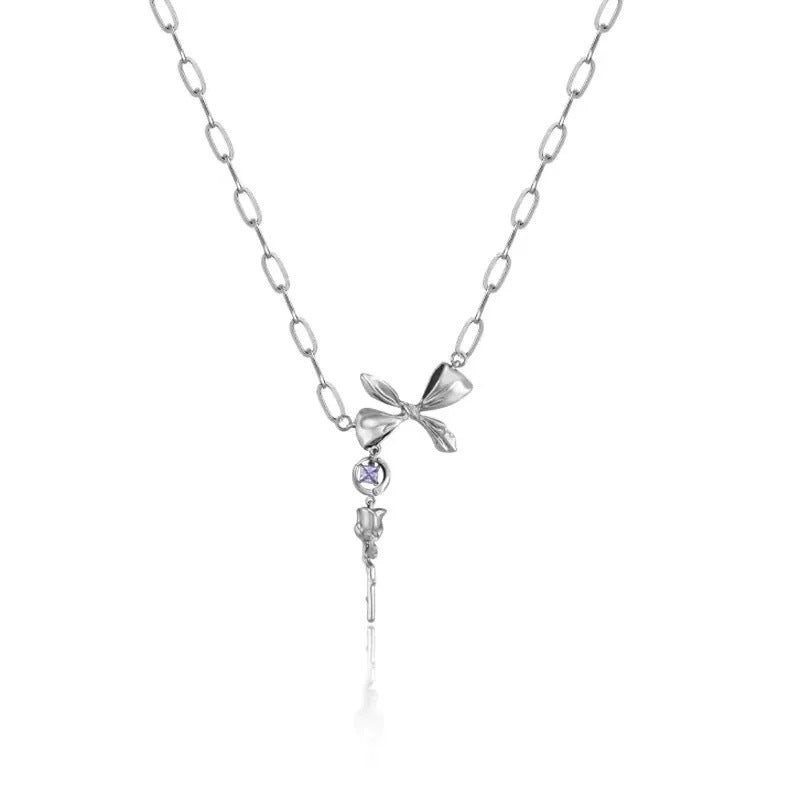 Damen Halskette mit verspieltem Schleifenanhänger und glitzerndem Zirkonia Shop Nory