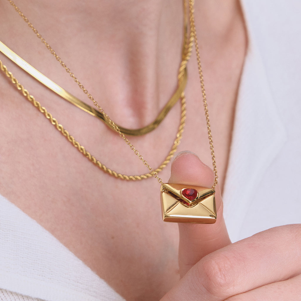 Damen Halskette mit herzförmigem Anhänger und eleganter Liebesbotschaft Shop Nory