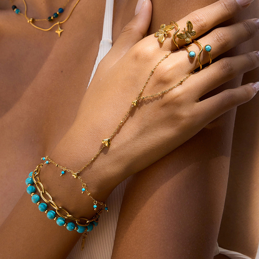 Damen Armband mit zarten Herzen und bunten Perlenakzenten Shop Nory