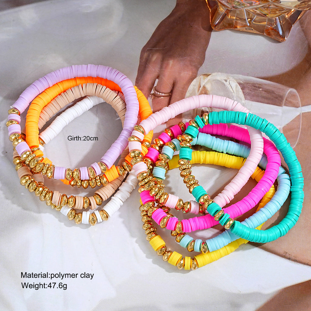 Damen Armband-Set mit bunten Perlen und goldenen Akzenten Shop Nory