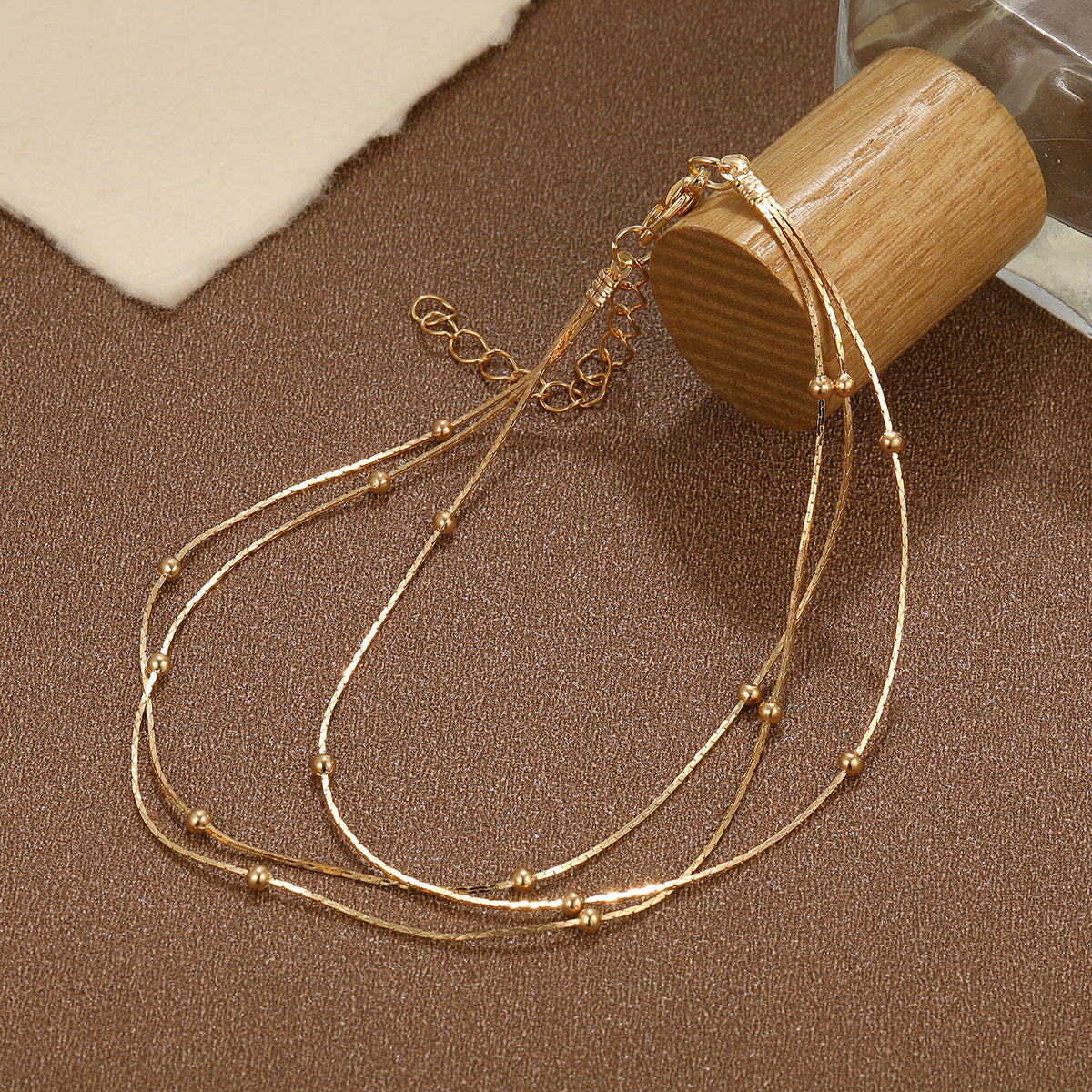 Damen Fußkettchen mit eleganten, goldenen Akzenten Shop Nory