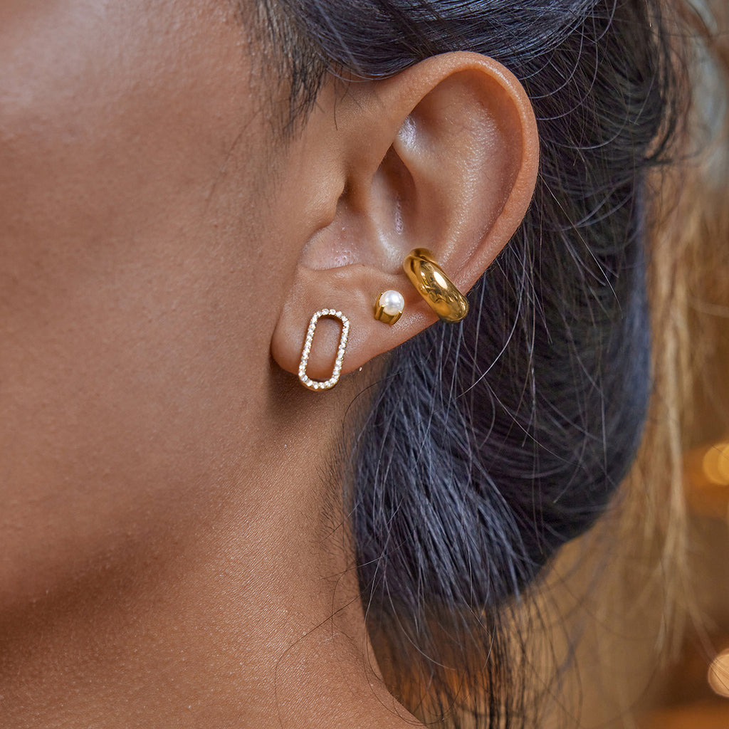 Damen Creolen im modernen, geschwungenen Design aus hochwertigem Edelstahl Shop Nory