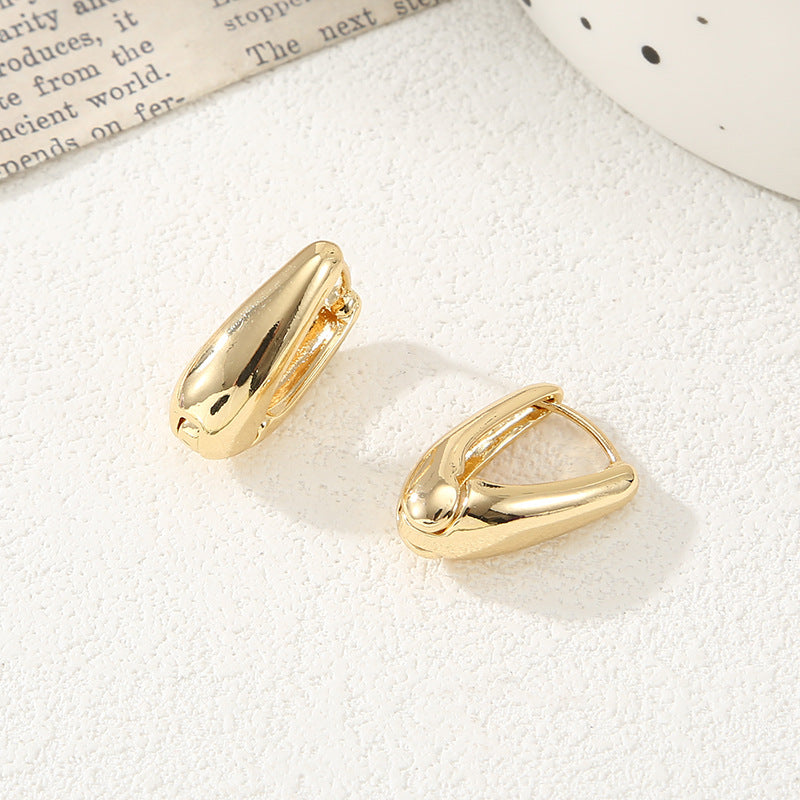 Damen Ohrringe mit elegantem, geschwungenem Design Shop Nory