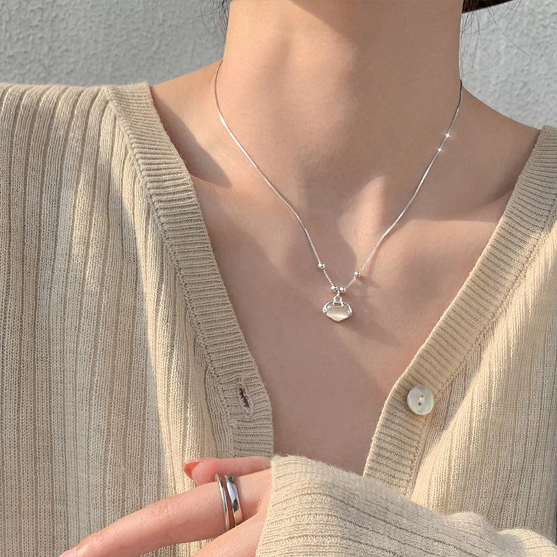 Damen Halskette mit elegantem Herzanhänger und funkelnden Akzenten Shop Nory