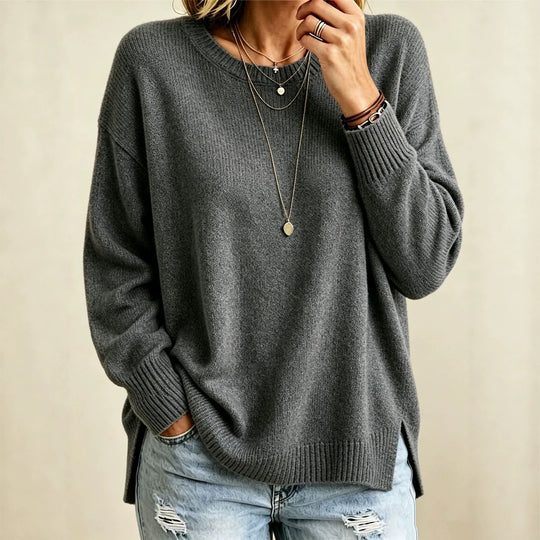 Damen Locker geschnittener Rundhals-Feinstrickpullover mit Seitenschlitzen und gerippten Bündchen Shop Nory