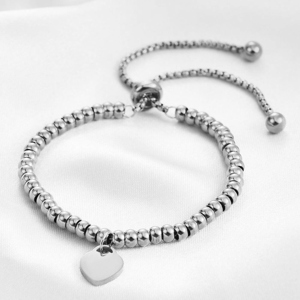 Damen Armband mit herzförmigem Anhänger und modernem Design Shop Nory
