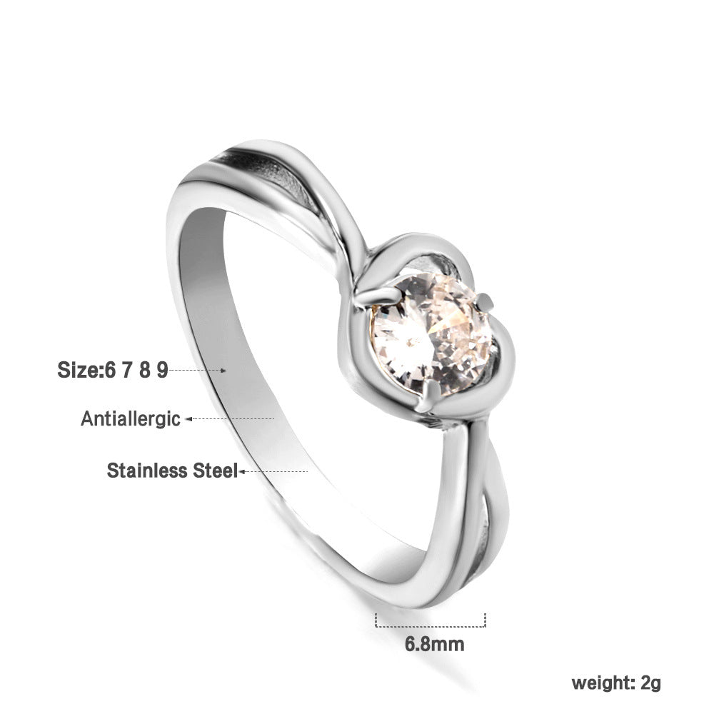 Damen Ring mit brillantem Zirkonia und eleganter Edelstahlfassung Shop Nory