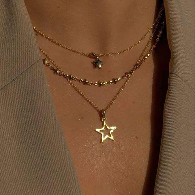 Damen mehrlagige Halskette mit Sternanhänger und eleganten Perlenakzenten Shop Nory