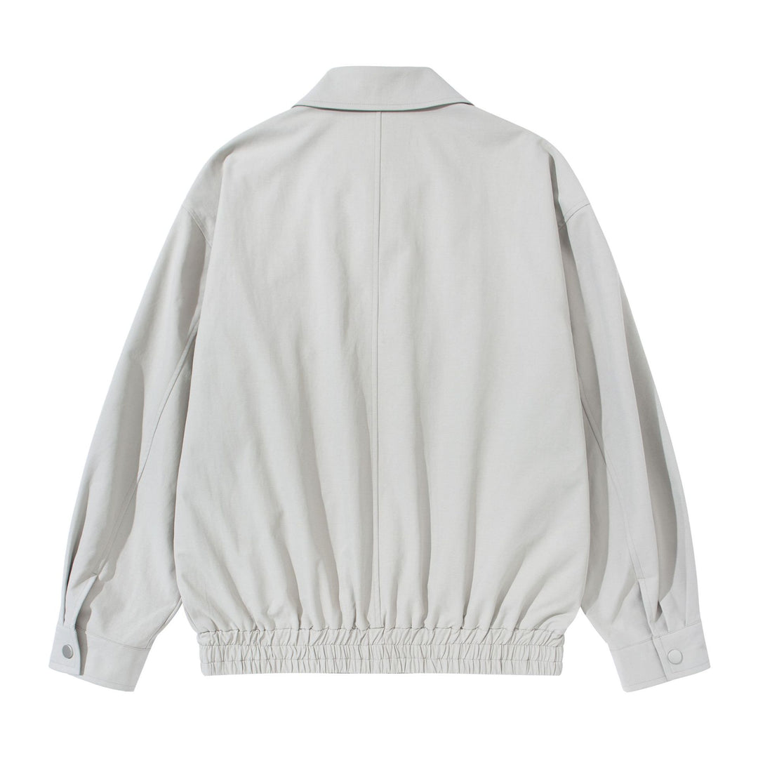 Unisex Kurz geschnittene Boxy-Blousonjacke mit Hemdkragen, verdecktem Reißverschluss und gerafftem Saum Shop Nory