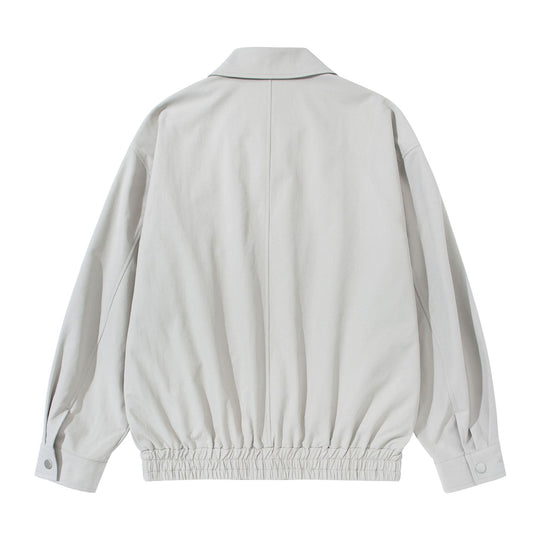 Unisex Kurz geschnittene Boxy-Blousonjacke mit Hemdkragen, verdecktem Reißverschluss und gerafftem Saum Shop Nory