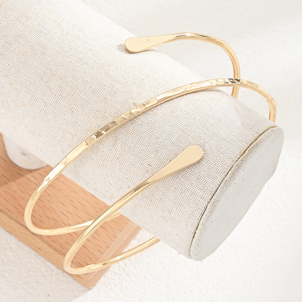 Damen Armreif-Set mit elegantem, geschwungenem Design und polierten Oberflächen Shop Nory