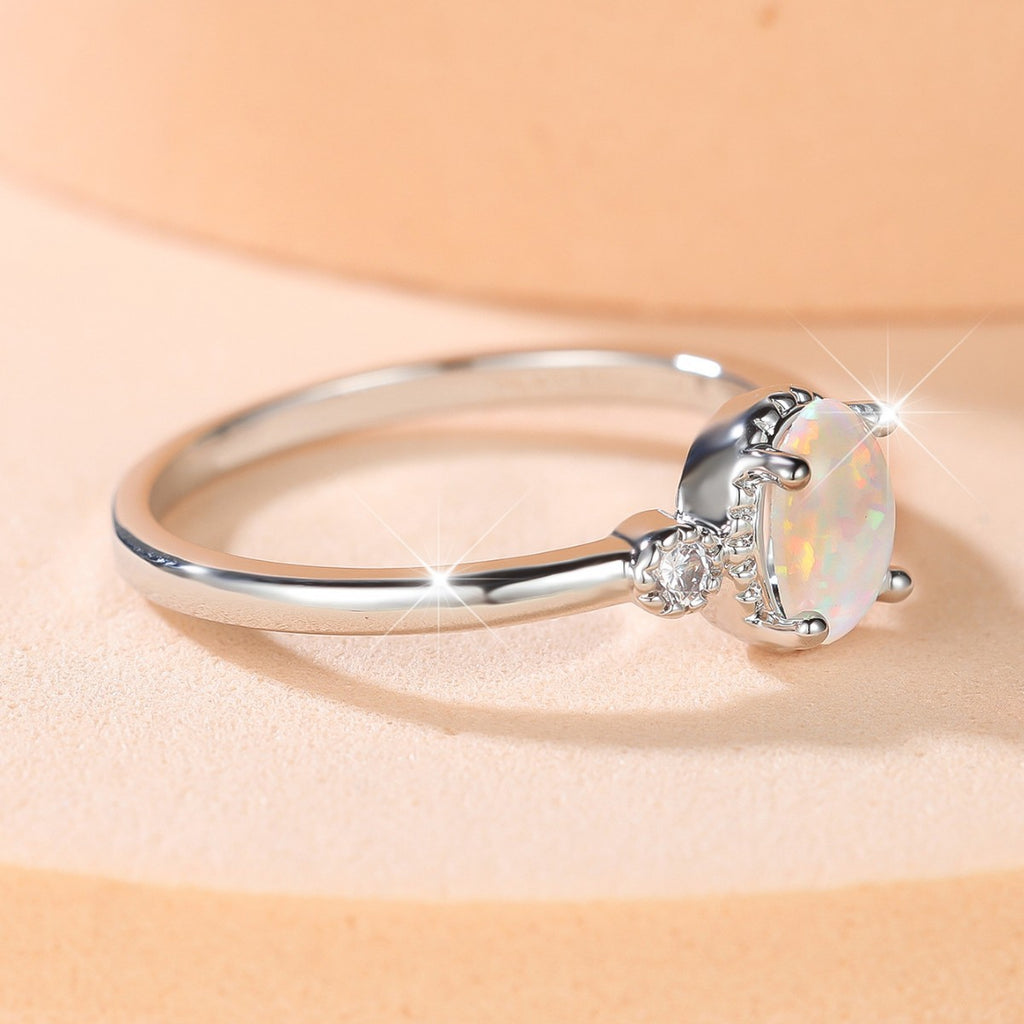 Damen Ring mit schimmerndem Opal und funkelnden Zirkonia Shop Nory