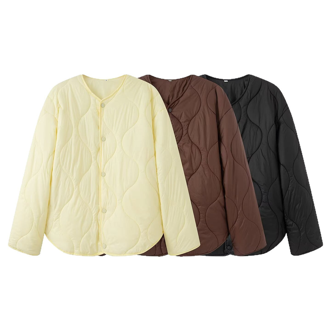 Damen Steppjacke mit Oversize‑Schnitt, Rundhals und geschwungenem Saum Shop Nory