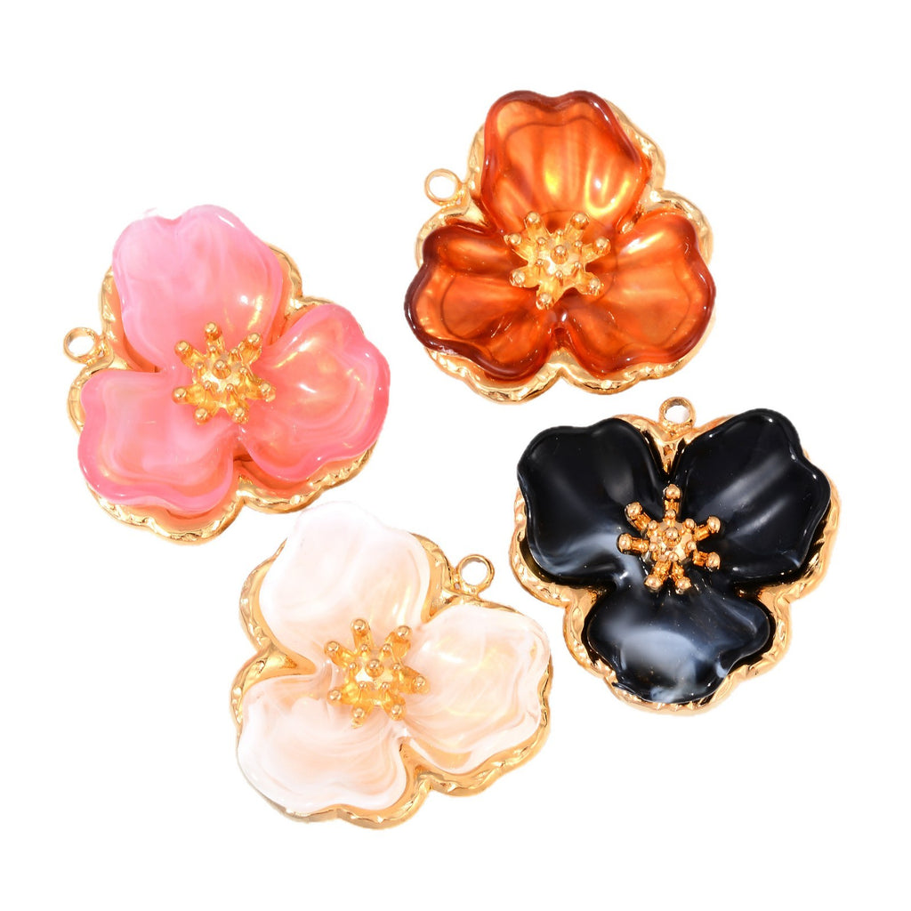 Damen Schmuckanhänger in Form einer filigranen Blüte mit goldener Akzentuierung Shop Nory