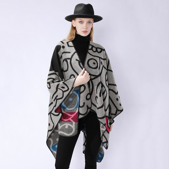 Damen Oversize-Poncho im künstlerischen Print mit zweifarbiger Kantenverarbeitung und asymmetrischem Zipfelsaum Shop Nory